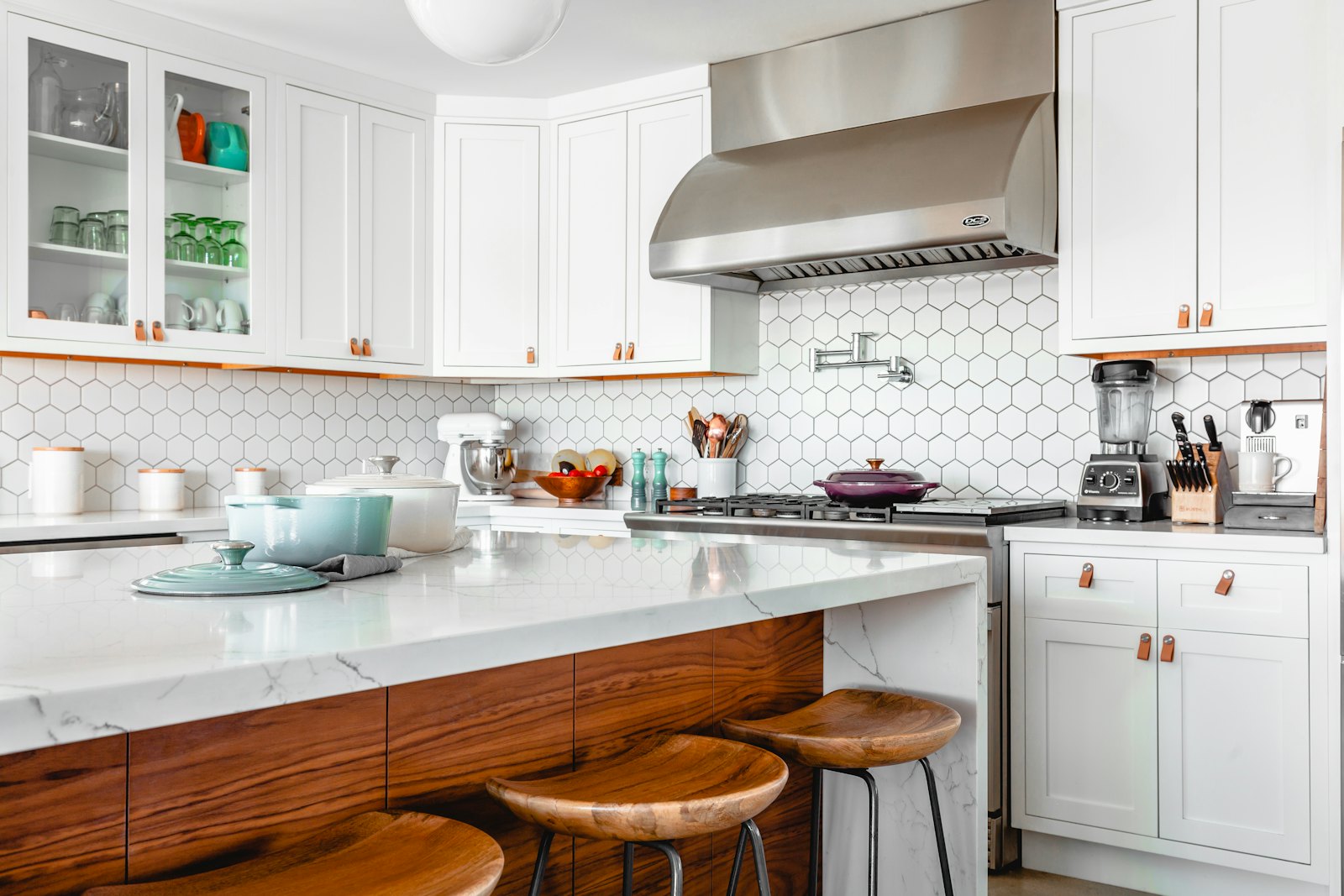 A tidy kitchen with a dining table